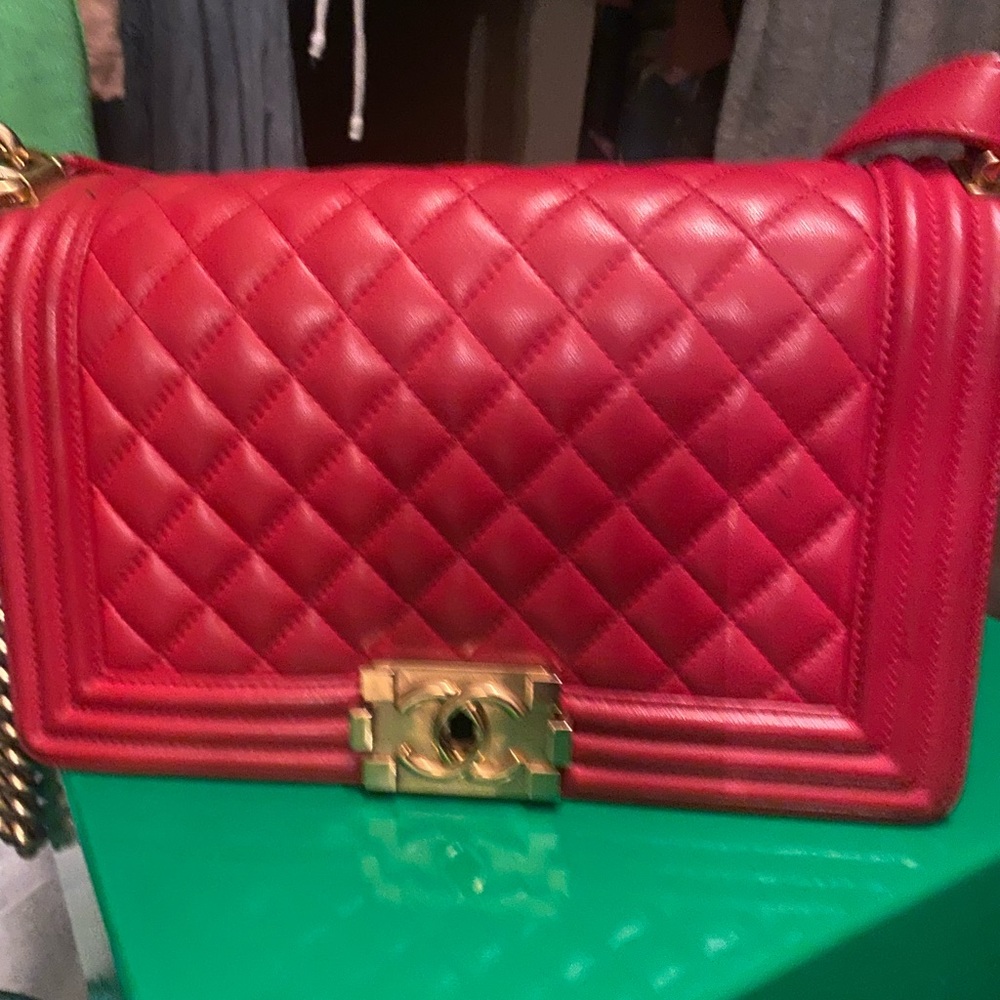 Red wear corners of bag exterior authentic good condition